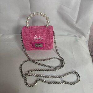 Barbie purse with faux pearl handle and cross body chain.